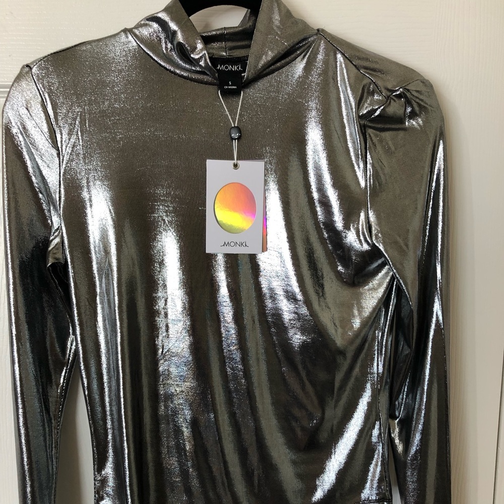 Silver long sleeve sleek top worn mock neck